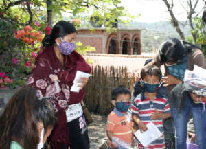 Mother and Children are given cloth masks