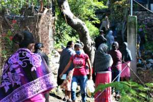 Women line up for food distribution 6-10 July