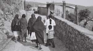 Women walking to Atzin Centre