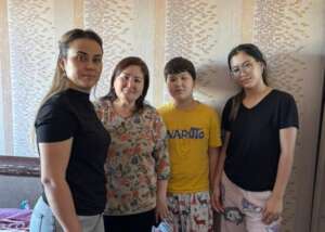 Dilfuza with Salem's Raihan and two of her kids