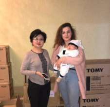 Ulianna presenting much needed supplies for kids