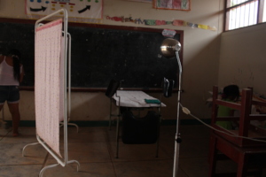 Setting up medical equipment at the local school