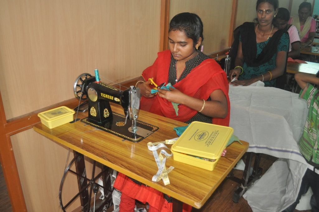 provide sewing machine to 6 poor women to earn