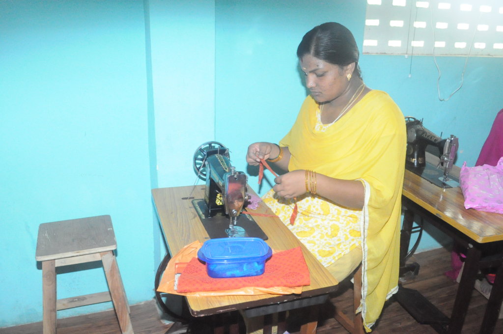 provide sewing machine to 6 poor women to earn