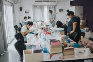 Women learning to make cards
