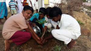 Children planting trees