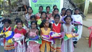 Children receiving new clothes