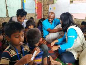 UNICEF team with the children