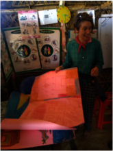 Eva  with her art projects