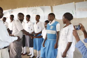 Girls receives learning materials