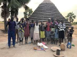 Villagers at well rehabilitation site