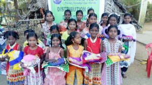 Children receiving dresses