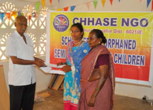 Child receiving school fee