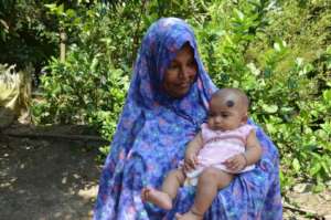 Raisa with her grandmother