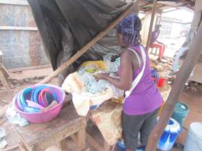 Marie in her small shed