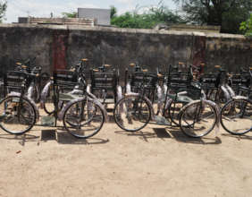 Tricycles,hearing aid,specs to poor disabled child