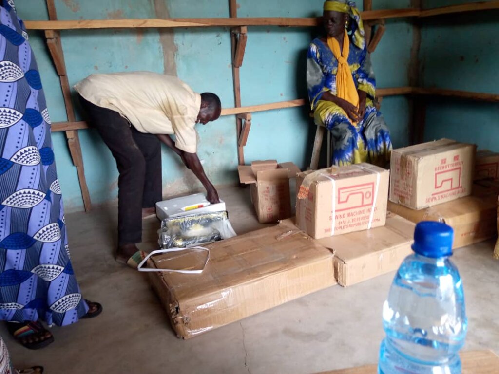 A newly rented tailoring shop being set up