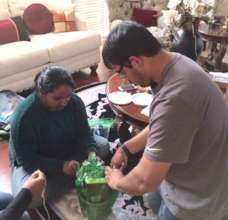 Volunteers helping prepare the gift baskets