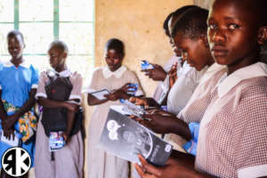 Girls of Soko receiving Sanitary Pad Kits