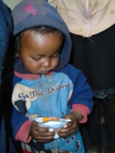 Cute girl getting her supplements in Ambomangakely
