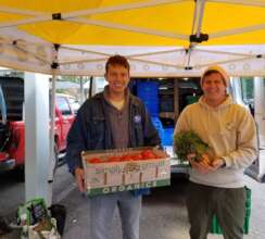 Receiving donations at the Farmers Market