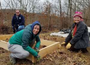 Volunteers help get gardens ready for the season!