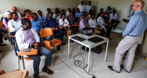 HVO volunteers giving a lecture in Ghana