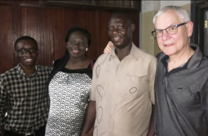 Ghanian providers and patient with Dr. Lalonde