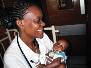 Health worker with young patient
