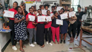 Girls celebrating the completion of their program