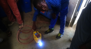 Felix working on his hydropower prototype