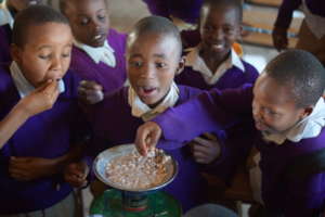 Students trying out one of the Twende technologies