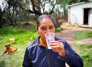 Drinking freshly filtered rainwater in Pozo Hondo