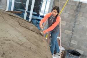 A student in our Water School learns to build