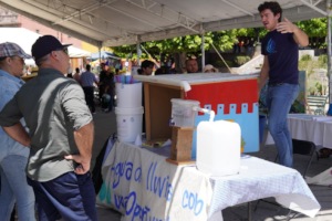Caminos staff teaches rainwater at the water fair