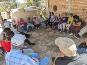 Donors and residents talking during a site visit
