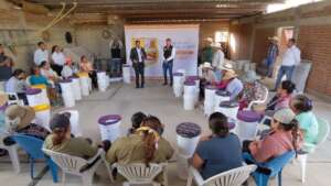The local Mayor talks at a water filter workshop