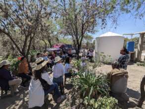Visitors learn about rainwater harvesting