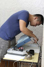 Technicians setting up equipment