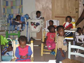 The group - watching Dora the Explorer on TV