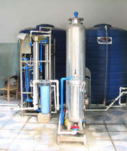 A similar water filtration system in use in Haiti