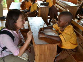 ACE President, Yuka Iwatsuki with a school child