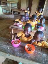 Children eating school lunch