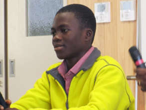 Godfred making speech in Japan