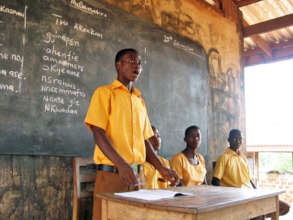 Godfred in a classroom