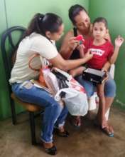 Mother learning a new skill to be taught