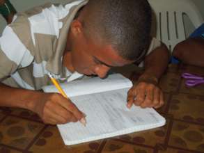 Yoryi doing his class work