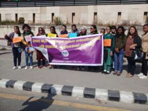 Nikiba (2nd from right) on protest rally on VAW