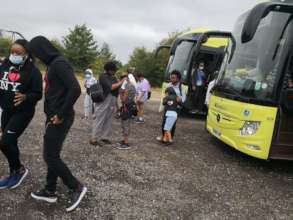 Boarding off the coach to the resort park