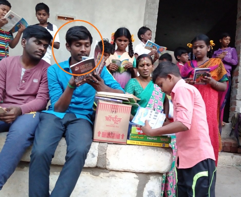 Raju going through a book
